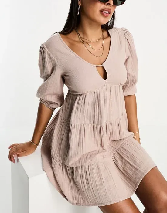 https://images.styletyx.com/images/isla-bird-tiered-mini-summer-dress-in-blush-nude-iisla-bird-997641320_2.webp