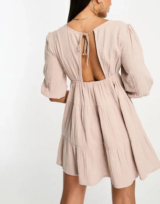 https://images.styletyx.com/images/isla-bird-tiered-mini-summer-dress-in-blush-nude-iisla-bird-997641320_3.webp