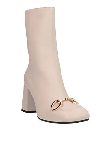 https://images.styletyx.com/images/ivory-ankle-boot-for-you-16656221_2.webp