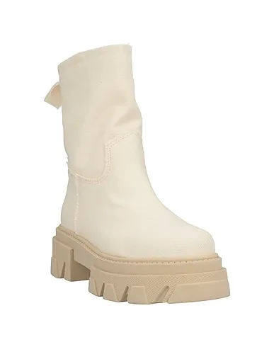 https://images.styletyx.com/images/ivory-canvas-ankle-boot-noa-a-3328691_2.webp
