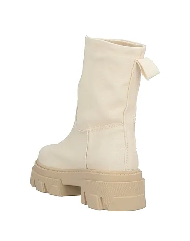 https://images.styletyx.com/images/ivory-canvas-ankle-boot-noa-a-3328691_3.webp