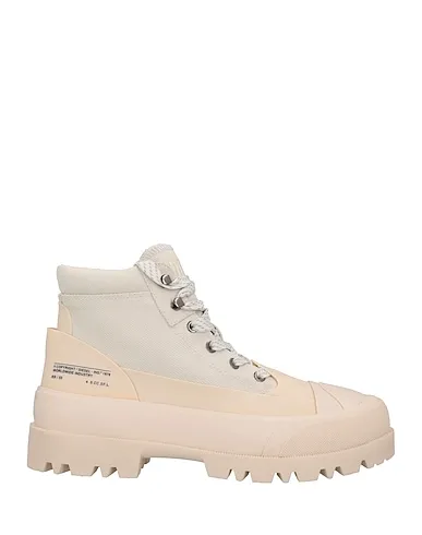 https://images.styletyx.com/images/ivory-canvas-boots-diesel-13363226_1.webp