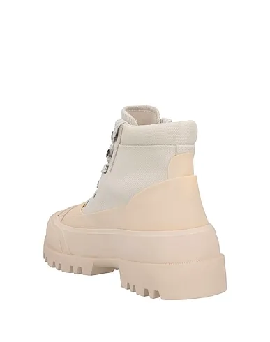https://images.styletyx.com/images/ivory-canvas-boots-diesel-13363226_3.webp