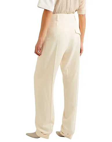 https://images.styletyx.com/images/ivory-cotton-twill-casual-pants-haider-ackermann-1576539_3.webp