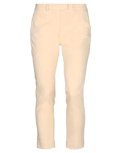 https://images.styletyx.com/images/ivory-cotton-twill-casual-pants-peuterey-664463843_1.webp