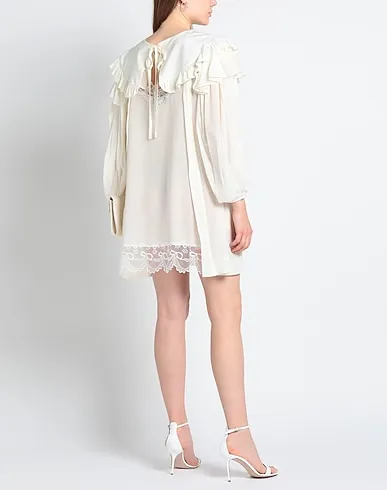https://images.styletyx.com/images/ivory-crepe-short-dress-simone-rocha-1456931689_4.webp