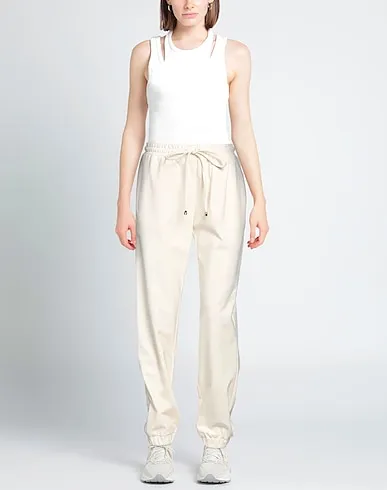 https://images.styletyx.com/images/ivory-jersey-casual-pants-twenty-easy-by-kaos-1491649284_2.webp
