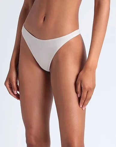 https://images.styletyx.com/images/ivory-jersey-thongs-the-nude-label-1646688_2.webp