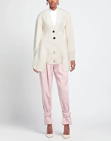 https://images.styletyx.com/images/ivory-knitted-cardigan-alexander-mcqueen-3107799_2.webp