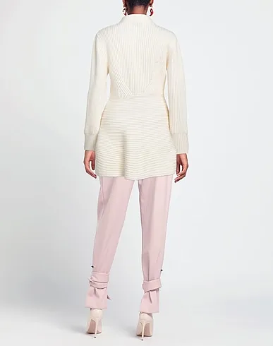 https://images.styletyx.com/images/ivory-knitted-cardigan-alexander-mcqueen-3107799_3.webp