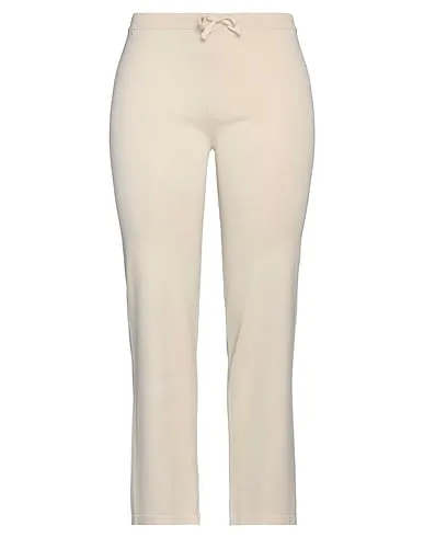 https://images.styletyx.com/images/ivory-knitted-casual-pants-compagnia-italiana-3181684_1.webp