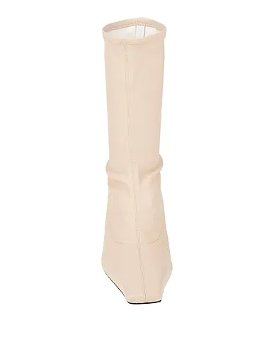 https://images.styletyx.com/images/ivory-leather-ankle-boot-proenza-schouler-13419383_4.webp