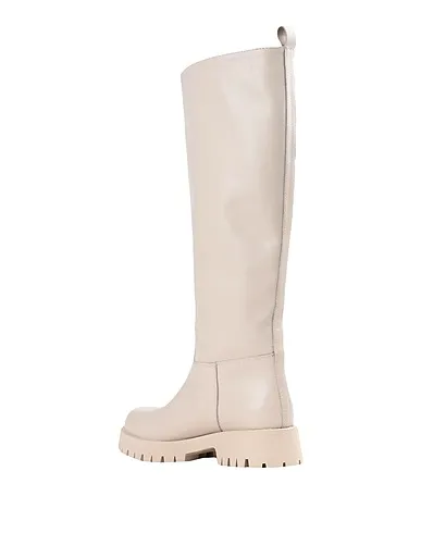 https://images.styletyx.com/images/ivory-leather-biker-boots-jonak-1328364_3.webp