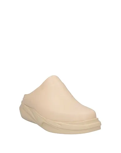 https://images.styletyx.com/images/ivory-leather-mules-and-clogs-1017-alyx-9sm-12916354_2.webp