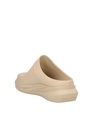 https://images.styletyx.com/images/ivory-leather-mules-and-clogs-1017-alyx-9sm-12916354_3.webp