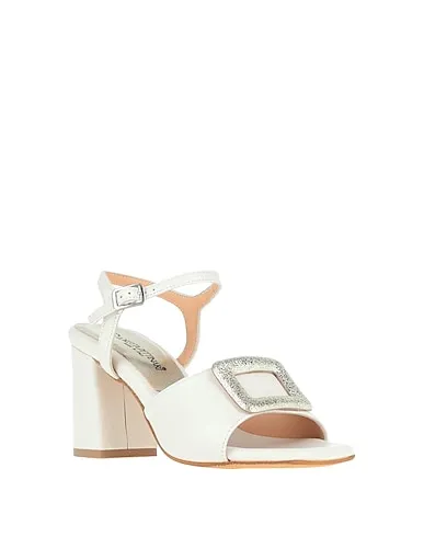 https://images.styletyx.com/images/ivory-leather-sandals-loretta-pettinari-575182_2.webp