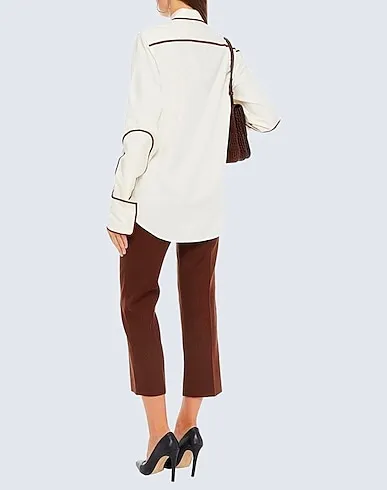 https://images.styletyx.com/images/ivory-plain-weave-silk-shirts-blouses-victoria-beckham-13311300_3.webp