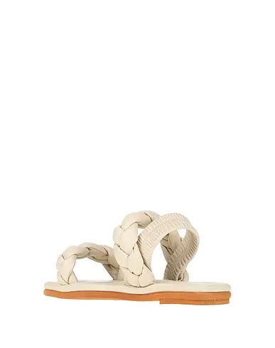 https://images.styletyx.com/images/ivory-sandals-181-1398507_3.webp