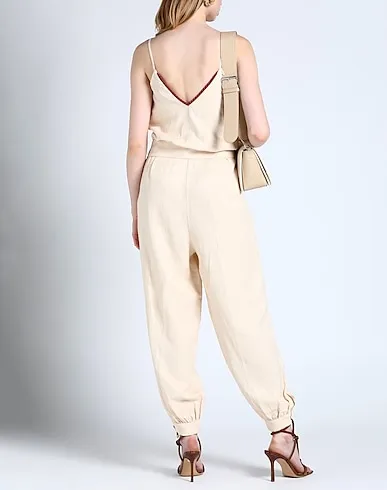 https://images.styletyx.com/images/ivory-satin-jumpsuit-one-piece-jijil-878822135_3.webp