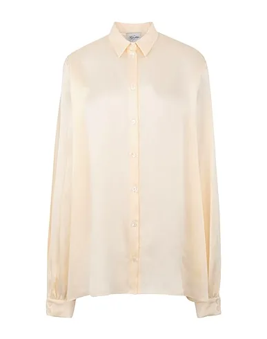 https://images.styletyx.com/images/ivory-satin-silk-shirts-blouses-redemption-1103436_1.webp