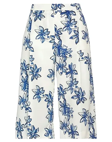 https://images.styletyx.com/images/ivory-techno-fabric-cropped-pants-culottes-nina-ricci-3074767_1.webp