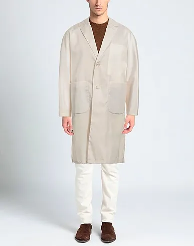 https://images.styletyx.com/images/ivory-techno-fabric-full-length-jacket-hevo-13119012_2.webp