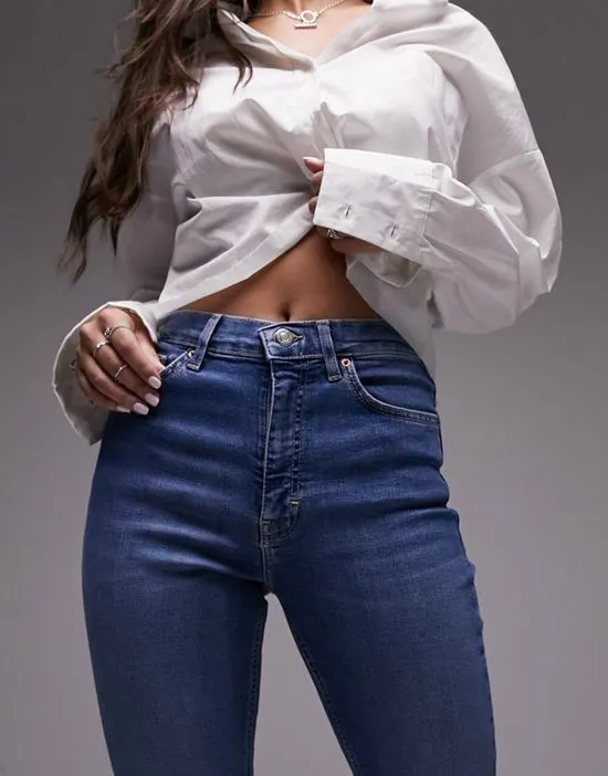 https://images.styletyx.com/images/jamie-flare-jeans-in-mid-blue-topshop-hourglass-3269554_5.webp