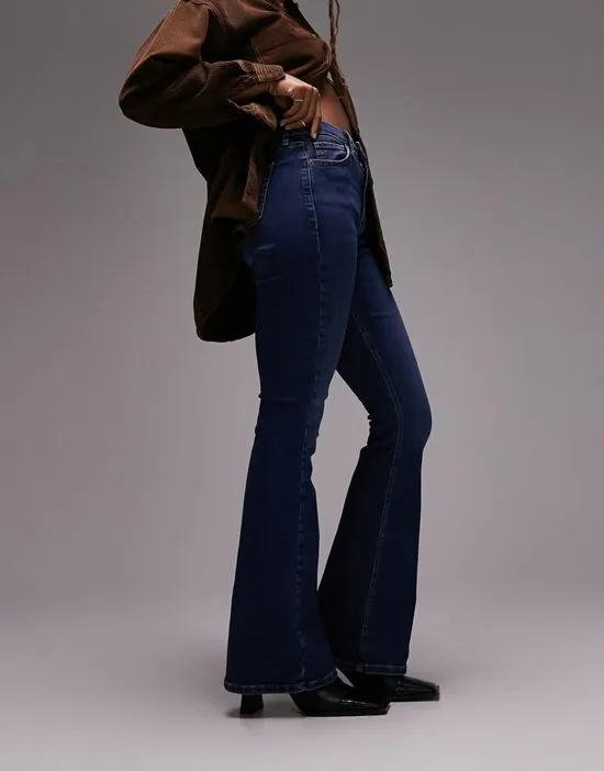 https://images.styletyx.com/images/jamie-flare-jeans-in-rich-blue-topshop-hourglass-2940097_1.webp
