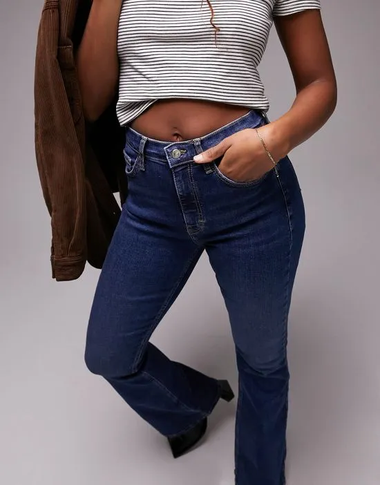 https://images.styletyx.com/images/jamie-flare-jeans-in-rich-blue-topshop-hourglass-2940097_2.webp