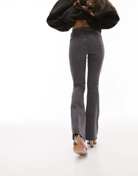 https://images.styletyx.com/images/jamie-flare-jeans-in-washed-black-topshop-hourglass-3301028_2.webp
