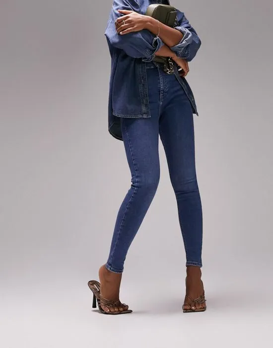 https://images.styletyx.com/images/jamie-jeans-in-mid-blue-topshop-hourglass-2752850_1.webp