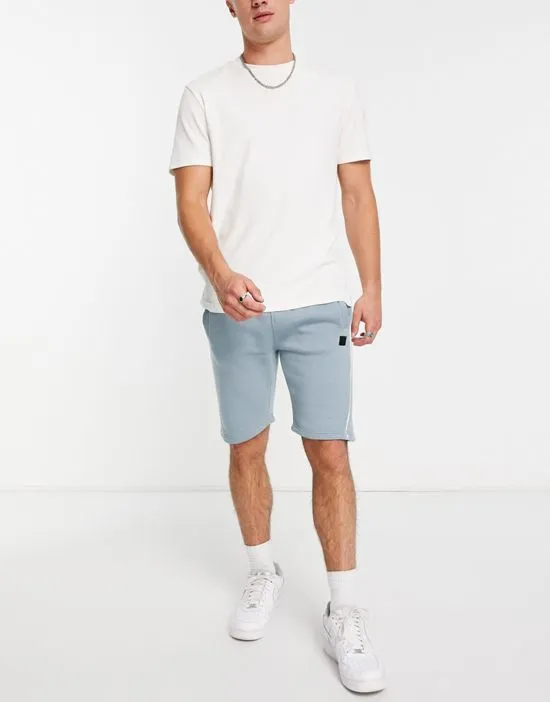 https://images.styletyx.com/images/jersey-shorts-with-piping-in-pale-blue-part-of-a-set-soul-star-3020324_2.webp