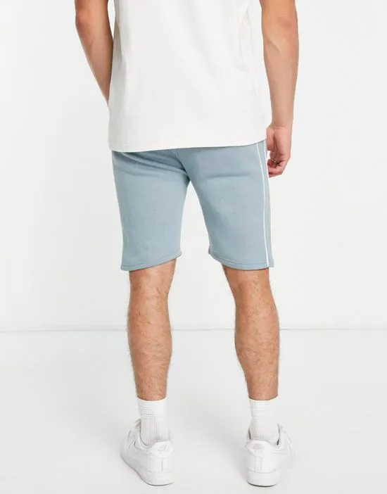 https://images.styletyx.com/images/jersey-shorts-with-piping-in-pale-blue-part-of-a-set-soul-star-3020324_4.webp