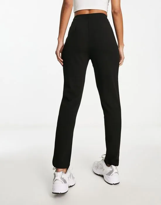 https://images.styletyx.com/images/jersey-tapered-suit-pants-in-black-asos-design-2484104_4.webp