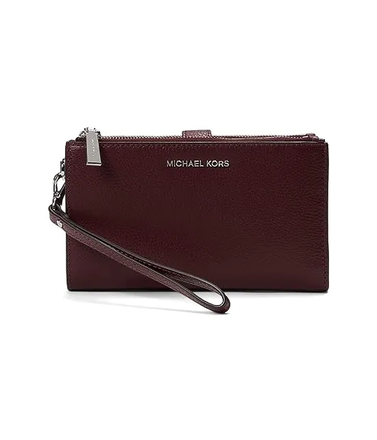 https://images.styletyx.com/images/jet-set-double-zip-wristlet-michael-kors-2686531_1.webp