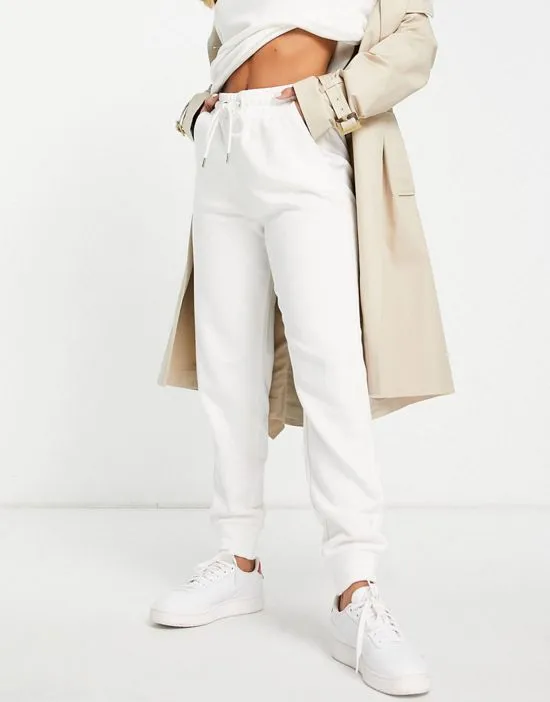 https://images.styletyx.com/images/jo-cotton-fleece-sweatpants-in-off-white-lindex-2685070_2.webp