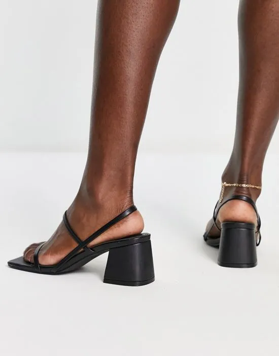 https://images.styletyx.com/images/just-realise-strappy-mid-heel-sandals-in-black-pu-public-desire-1738569_4.webp