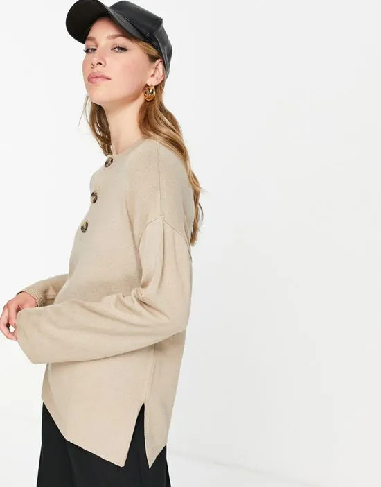 https://images.styletyx.com/images/knitted-oversized-sweatshirt-in-beige-na-kd-1789467_3.webp