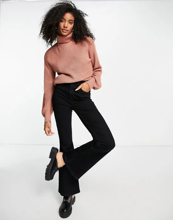 https://images.styletyx.com/images/knitted-roll-neck-sweater-with-volume-sleeves-in-rose-pink-vila-1770365_2.webp