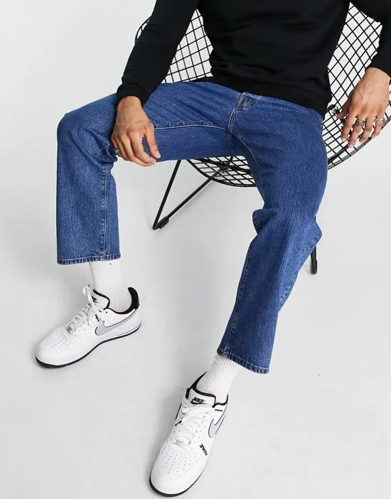 https://images.styletyx.com/images/kobe-wide-fit-jeans-in-mid-blue-selected-homme-1837371_3.webp