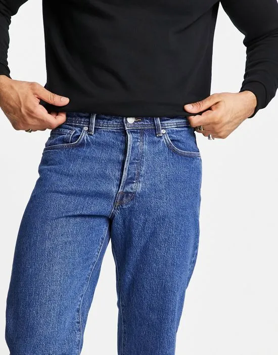 https://images.styletyx.com/images/kobe-wide-fit-jeans-in-mid-blue-selected-homme-1837371_4.webp