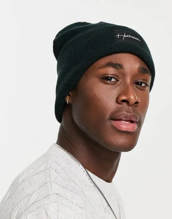 https://images.styletyx.com/images/label-logo-rib-knit-beanie-in-black-hollister-13647249_2.webp