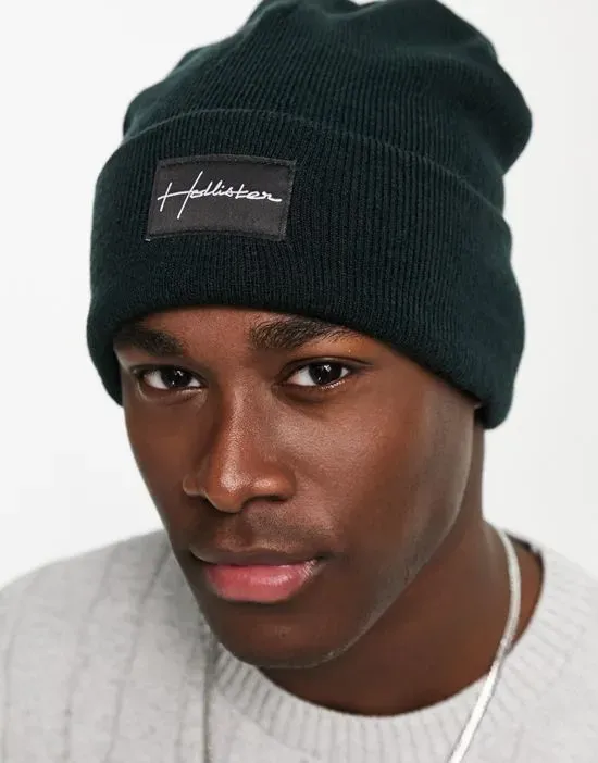https://images.styletyx.com/images/label-logo-rib-knit-beanie-in-black-hollister-13647249_4.webp