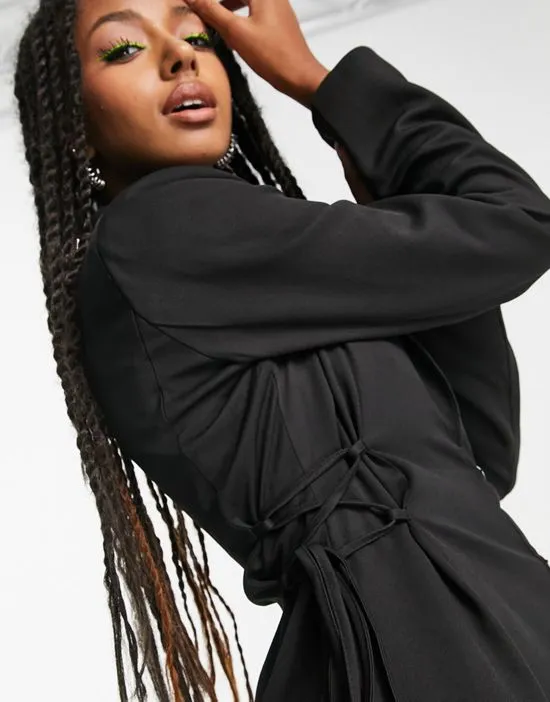 https://images.styletyx.com/images/lace-up-side-mini-blazer-dress-in-black-heartbreak-2342311_4.webp