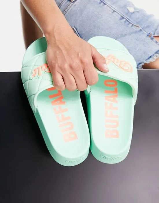 https://images.styletyx.com/images/lake-soft-quilted-sliders-in-aqua-buffalo-2772826_3.webp