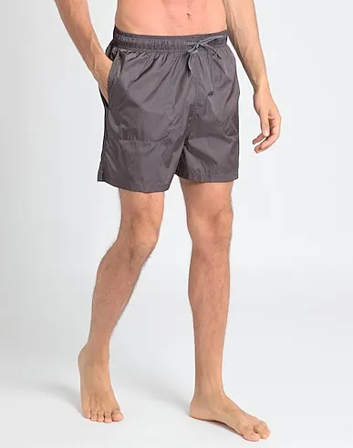 https://images.styletyx.com/images/lead-techno-fabric-swim-shorts-arket-674349_2.webp