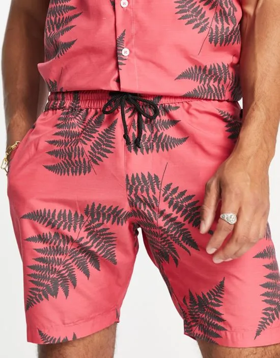 https://images.styletyx.com/images/leaf-print-shorts-in-coral-part-of-a-set-le-breve-1898459_3.webp