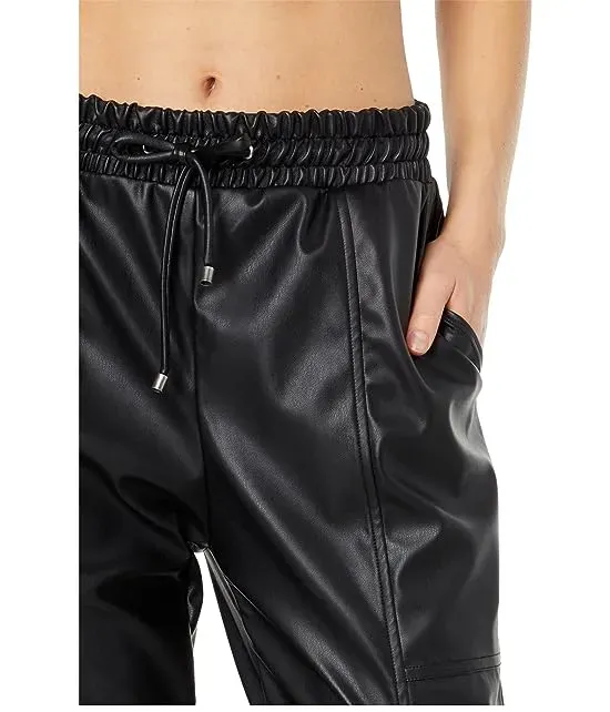 https://images.styletyx.com/images/leather-joggers-heroine-sport-3327038_3.webp