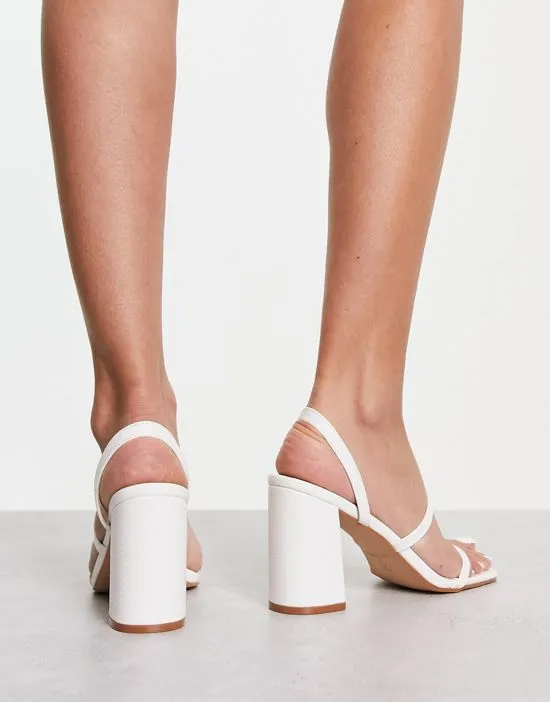 https://images.styletyx.com/images/libra-exclusive-block-heeled-sandals-in-white-lizard-raid-13250493_2.webp