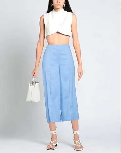 https://images.styletyx.com/images/light-blue-plain-weave-casual-pants-love-moschino-13286818_2.webp